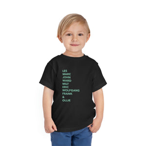 
            
                Load image into Gallery viewer, 9 Old Men Teal Text Toddler Tee
            
        